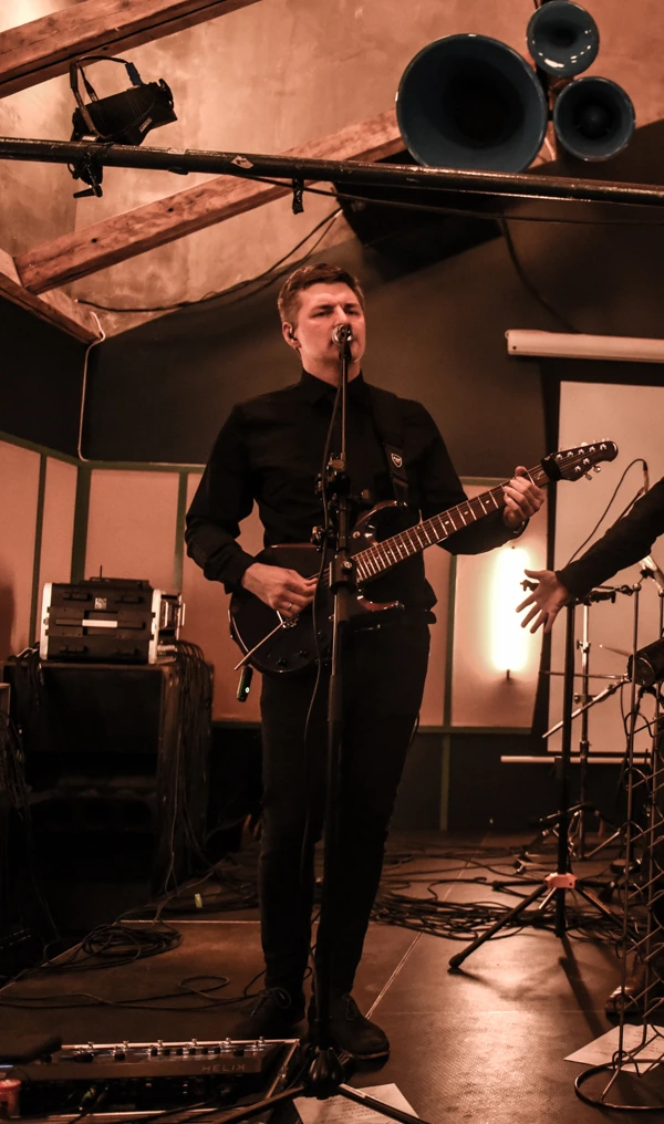 Tom playing guitar